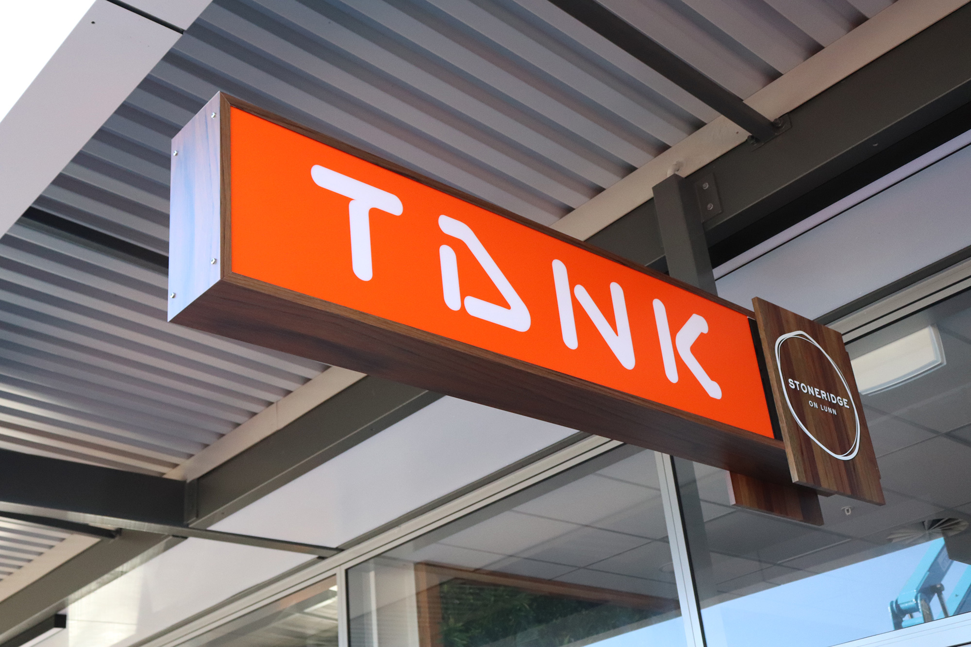Tank Juice internally lit verandah sign